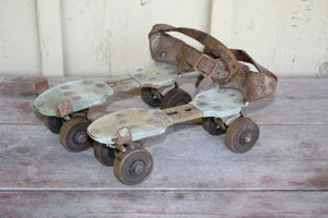 Old Pair of Roller Skates By Sunshine