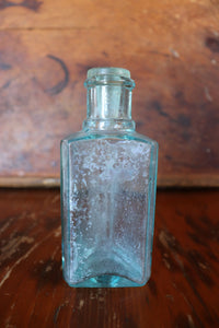 Old Glass Three Sided Bottle