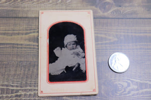 Old Tin Type Photograph Of  Baby In A Cardboard Frame