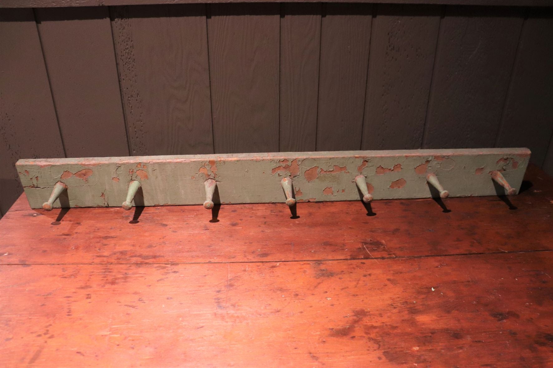 Old Wooden Peg Rack With Remnants Of Original Green Paint